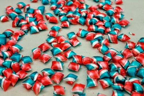 Delicious Candy Cane Pillows by Logan's Candies: A Sweet Treat That Never Expires! Wondering, 'Do Candies Expire?' - Not these timeless delights!